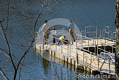 Family Fishing at Pandapas Pond Editorial Stock Photo